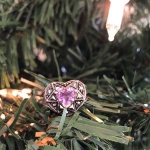 Sterling heart shape amethyst color stone ring.